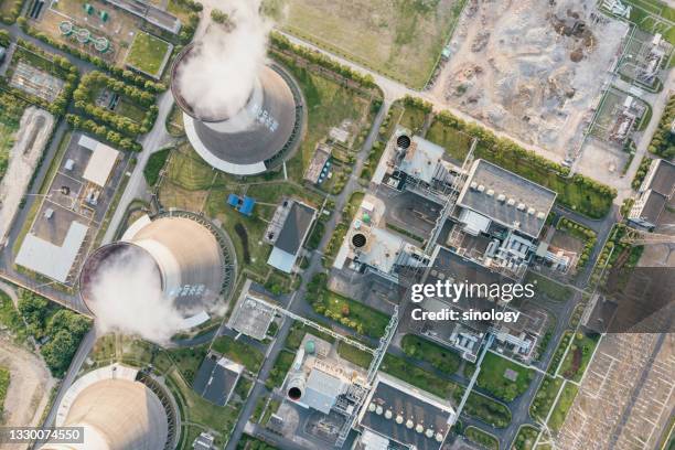 thermal power generators in the city - centrale elettrica foto e immagini stock