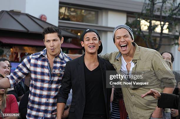 Alex Meraz, Bronson Pelletier and Chaske Spencer of the Wolfpack visit Extra at The Grove on November 15, 2011 in Los Angeles, California.