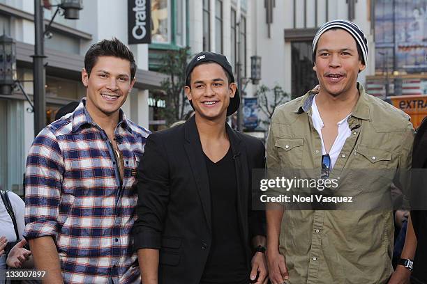 Alex Meraz, Bronson Pelletier and Chaske Spencer of the Wolfpack visit Extra at The Grove on November 15, 2011 in Los Angeles, California.