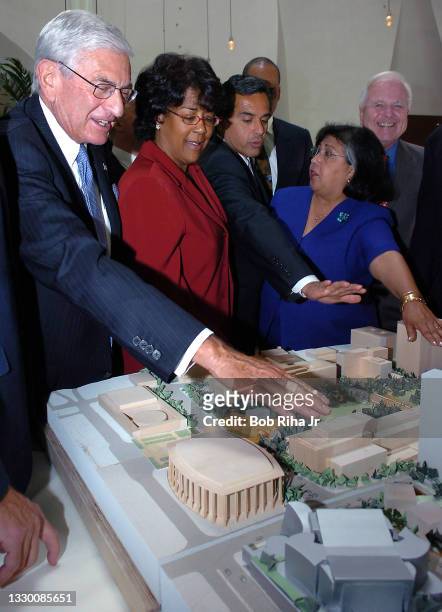 Grand Avenue Committee Chairman Eli Broad looks at the proposed $1.8 Billion master plan for the downtown development project with Councilwoman Jan...