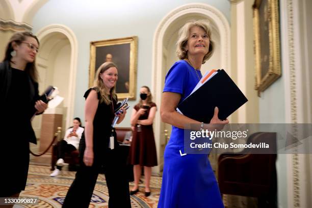 One of the principal negotiators in the bipartisan infrastructure plan, Sen. Lisa Murkowski arrives for a lunch meeting with Senate Republicans at...