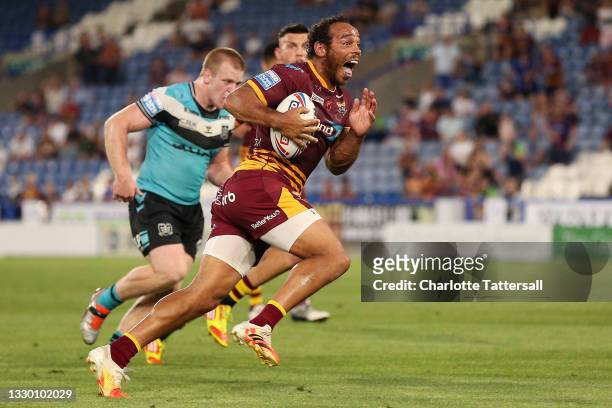 Leroy Cudjoe of Huddersfield Giants celebrates after scoring his team's eighth try during the Betfred Super League match between Huddersfield Giants...