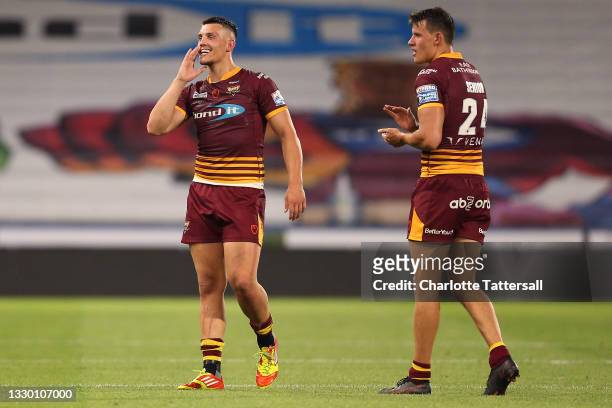 Owen Trout and Louis Senior of Huddersfield Giants reacts after the Betfred Super League match between Huddersfield Giants and Hull FC at John...