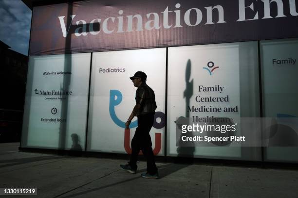 Health center advertises for the Covid-19 vaccine in a neighborhood near Brighton Beach on July 22, 2021 in the Brooklyn borough of New York City....