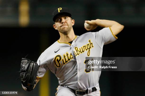 Starting pitcher Tyler Anderson of the Pittsburgh Pirates throws against the Arizona Diamondbacks during the first inning of the MLB game at Chase...