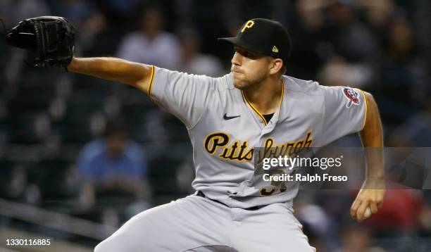 Starting pitcher Tyler Anderson of the Pittsburgh Pirates throws against the Arizona Diamondbacks during the second inning of the MLB game at Chase...