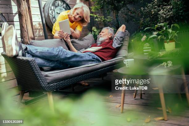 family time - garden ipad stock pictures, royalty-free photos & images