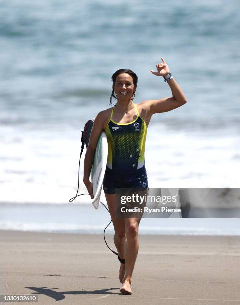 Sally Fitzgibbons of Team Australia runs from the water after a practice session at Tsurigasaki Surfing Beach ahead of the Tokyo 2020 Olympic Games...