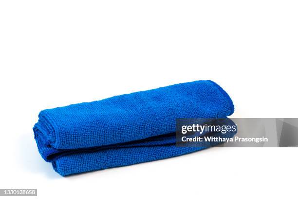blue microfiber cloth on isolate white background - towel stock-fotos und bilder