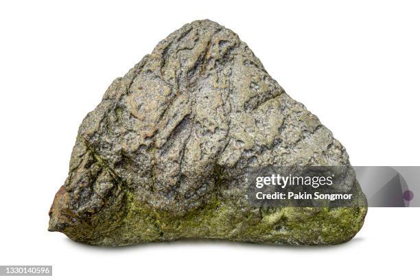 big piece of coarse rock with scratches and patterns isolated on white background. - felsbrocken stock-fotos und bilder