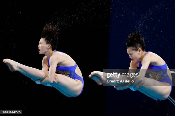 Synchronized divers from Team China practice ahead of the Tokyo 2020 Olympic Games at the Tokyo Aquatics Centre on July 23, 2021 in Tokyo, Japan.