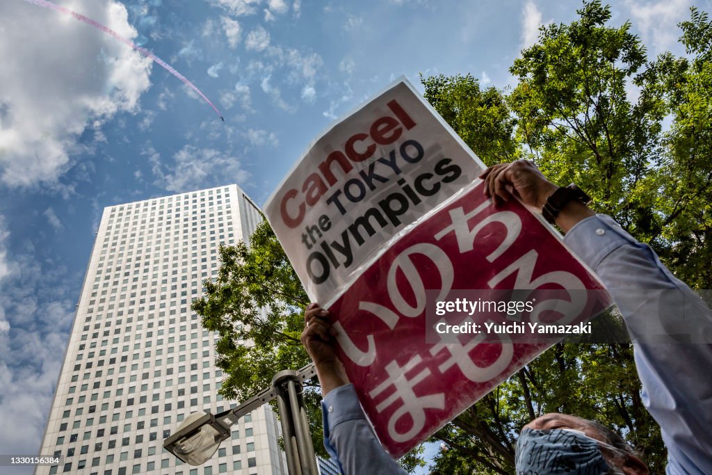 Protesters Gather During Olympic Torch Relay Ceremony In Tokyo