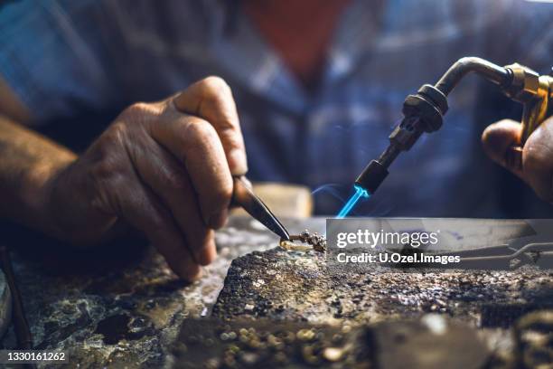 smokey room in jeweler's studio - jeweller bildbanksfoton och bilder