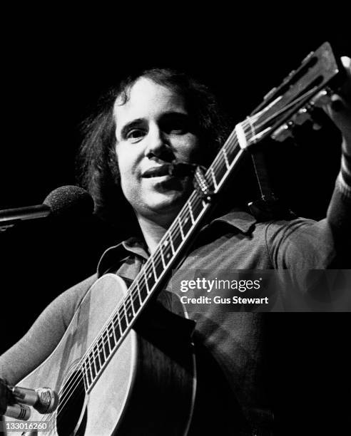 Paul Simon performs on stage at the Royal Albert Hall, London, 7th June 1973.