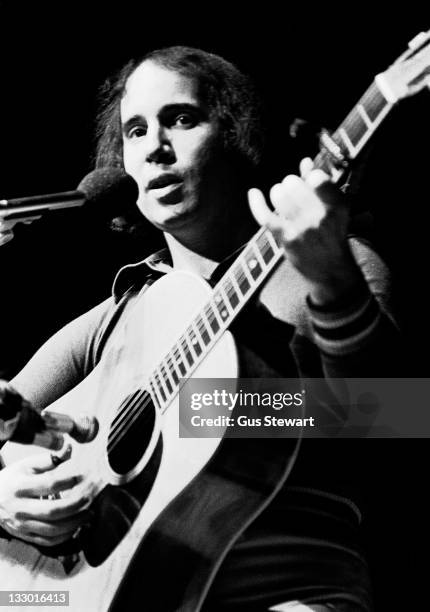 Paul Simon performs on stage at the Royal Albert Hall, London, 7th June 1973.