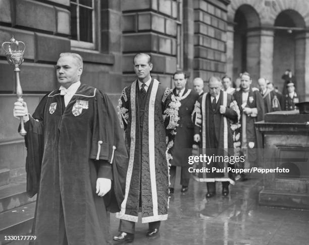Led by the University mace bearer, Prince Philip, Duke of Edinburgh , in his role as Chancellor of Edinburgh University, walks in procession during a...