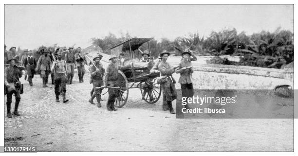antique black and white photograph: american infantry battalion, philippines - infantry stock illustrations