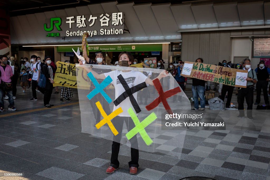 Protesters Gather Ahead Of The Tokyo Olympics Opening Ceremony