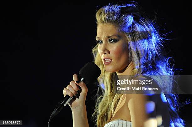 Delta Goodrem performs on stage at the opening of the Hilton Surfers Paradise, the Gold Coast's newest hotel, at Hilton Hotel on November 16, 2011 in...