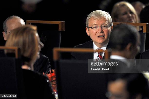 Australian Foreign Minister Kevin Rudd speaks across the table to Australian Prime Minister Julia Gillard and US President Barack Obama during a...