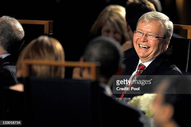 Australian Foreign Minister Kevin Rudd shares a joke across the table to Australian Prime Minister Julia Gillard and US President Barack Obama during...
