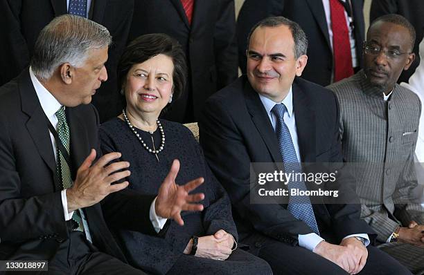 Shaukat Aziz, former prime minister of Pakistan, left, Zeti Akhtar Aziz, governor of Bank Negara Malaysia, second from left, Erdem Basci, governor of...