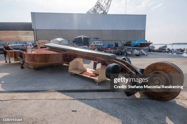 The violin boat is brought to the place where the presentation to the press on July 23, 2021 in Venice, Italy. The violin boat will be launched in...