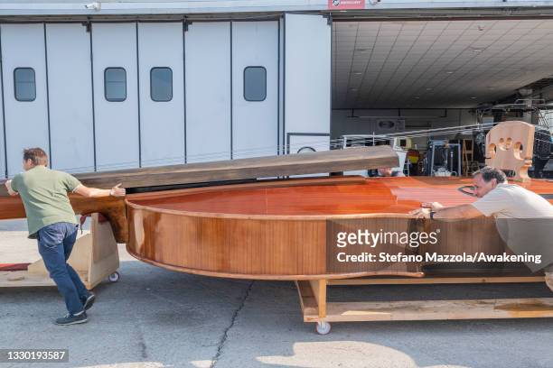 The violin boat is brought to the place where the presentation to the press on July 23, 2021 in Venice, Italy. The violin boat will be launched in...