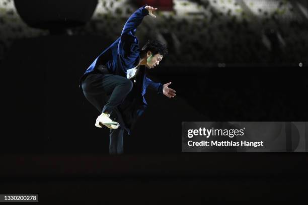 Performer dances on stage during the Opening Ceremony of the Tokyo 2020 Olympic Games at Olympic Stadium on July 23, 2021 in Tokyo, Japan.