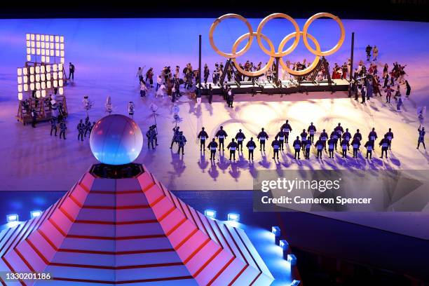 General view inside the stadium as fireworks go off and performers dance during the Opening Ceremony of the Tokyo 2020 Olympic Games at Olympic...