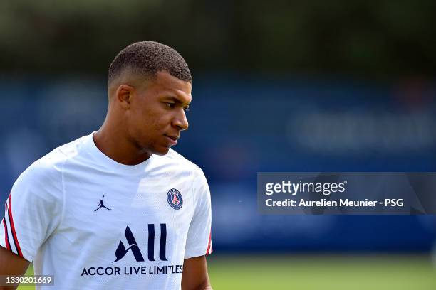 Kylian Mbappe reacts during a Paris Saint-Germain training session at Ooredoo Center on July 23, 2021 in Paris, France.