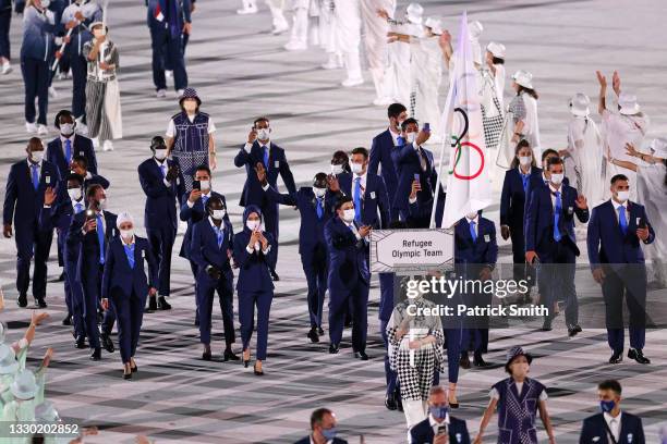 Flag bearers Yusra Mardini and Tachlowini Gabriyesos of The Refugee Olympic Team during the Opening Ceremony of the Tokyo 2020 Olympic Games at...