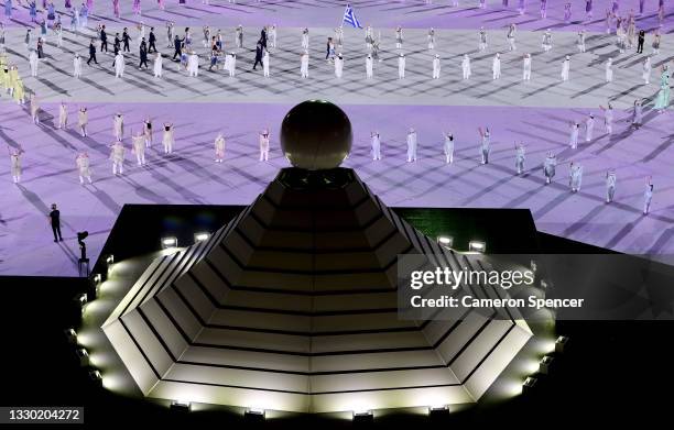 Flag bearers Anna Korakaki and Eleftherios Petrounias of Team Greece lead their team in during the Opening Ceremony of the Tokyo 2020 Olympic Games...