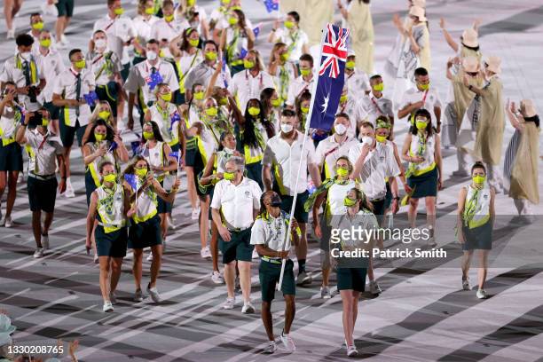 Flag bearers Cate Campbell and Patty Mills of Team Australia lead their team in during the Opening Ceremony of the Tokyo 2020 Olympic Games at...