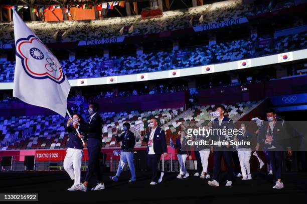 Flag bearers Hsing-Chun Kuo and Yen-Hsun Lu of Team Chinese Taipei during the Opening Ceremony of the Tokyo 2020 Olympic Games at Olympic Stadium on...