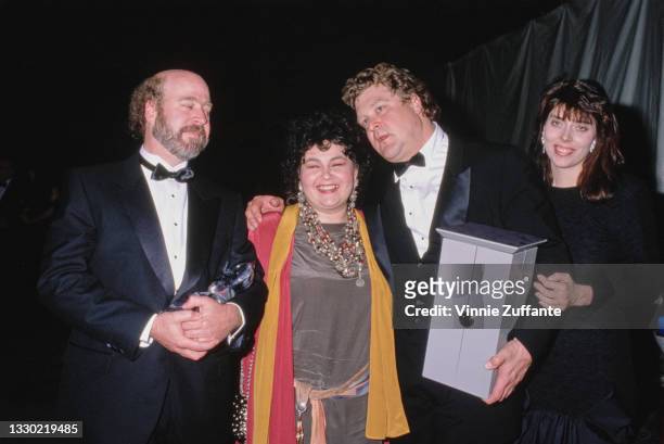 American television writer Bill Pentland with his wife, American comedian Roseanne Barr, American actor John Goodman, and his partner, Annabeth...