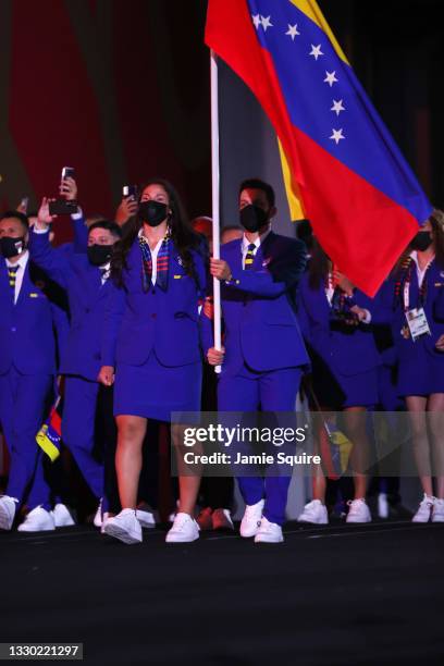 Flag bearers Karen Leon and Antonio Jose Diaz Fernandez of Team Venezuela during the Opening Ceremony of the Tokyo 2020 Olympic Games at Olympic...