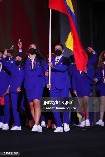 Flag bearers Karen Leon and Antonio Jose Diaz Fernandez of Team Venezuela during the Opening Ceremony of the Tokyo 2020 Olympic Games at Olympic...