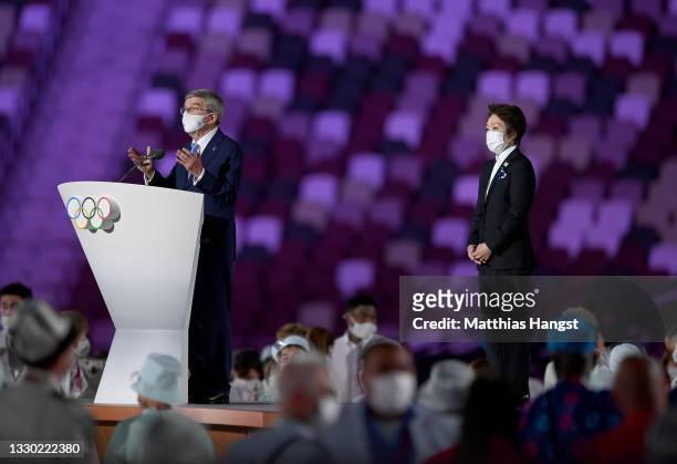 Thomas Bach, IOC President makes a speech as Seiko Hashimoto, Tokyo 2020 President looks on during the Opening Ceremony of the Tokyo 2020 Olympic...