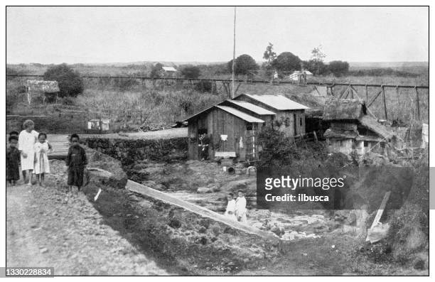 antique black and white photograph: japanese laborer's huts on a sugar plantation near hilo, hawaii - sugar shack stock illustrations