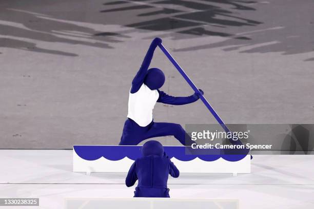 Dancers perform a pictogram of Olympic sports during the Opening Ceremony of the Tokyo 2020 Olympic Games at Olympic Stadium on July 23, 2021 in...