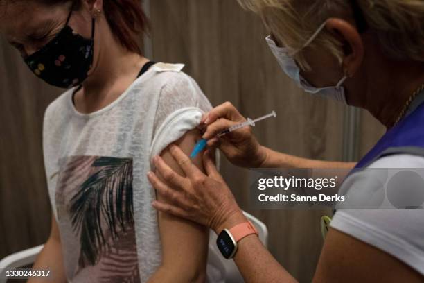 Woman is vaccinated on July 23, 2021 in Haarlem, Netherlands. Haarlem's municipal health service invited area residents to sign up for a blind date...