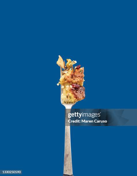 cornbread rice stuffing on fork - cornbread stuffing stock pictures, royalty-free photos & images