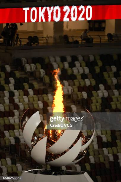 The Olympic cauldron and flame are seen after the Opening Ceremony of the Tokyo 2020 Olympic Games at Olympic Stadium on July 24, 2021 in Tokyo,...