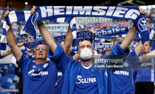 Fans of Schalke are seen during the Second Bundesliga match between FC Schalke 04 and Hamburger SV at Veltins Arena on July 23, 2021 in...
