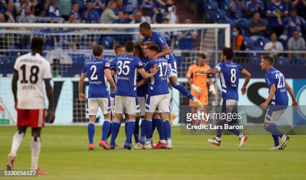 Simon Terodde of Schalke clebrates with team mates after scoring his teams first goal during the Second Bundesliga match between FC Schalke 04 and...