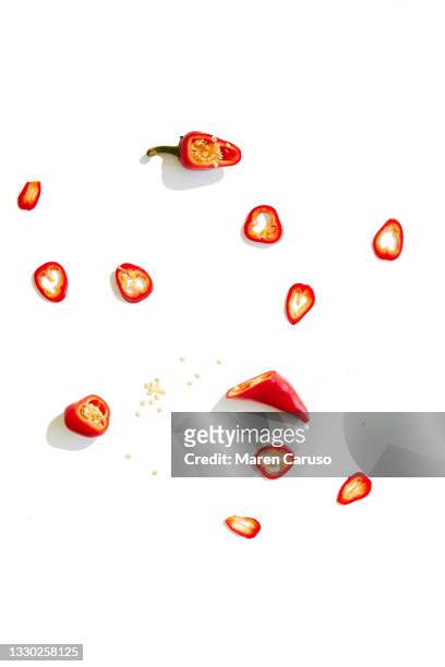 chili peppers cut - chilli stock pictures, royalty-free photos & images
