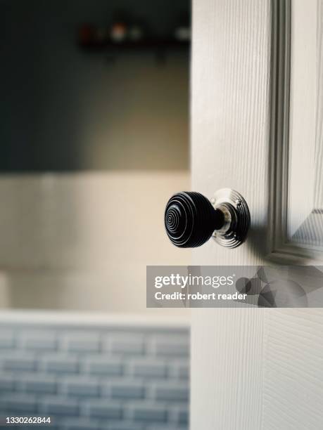 door handle on open door in bathroom - toilet door stock pictures, royalty-free photos & images