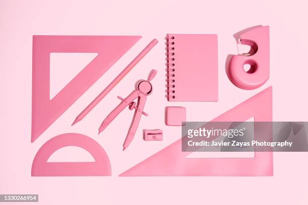 arrangement of pink stationery on pink background - knolling tools stock pictures, royalty-free photos & images