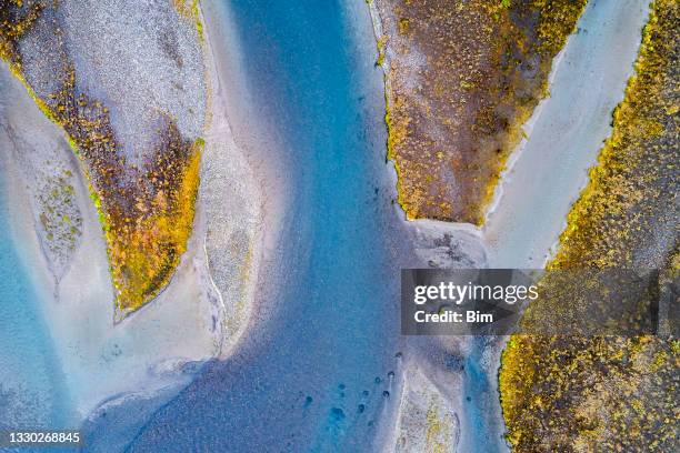 river in iceland, directly above view - flood plain stock pictures, royalty-free photos & images